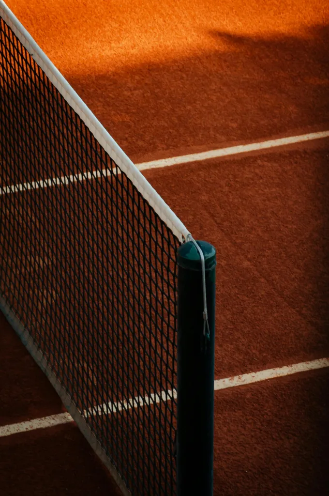 Cubre red de tenis de club en pista profesional de alta competición.