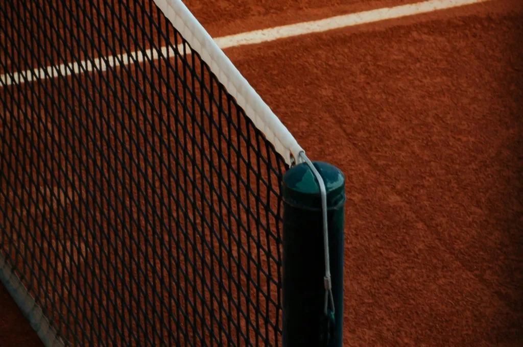 Cubre red de tenis de club en pista profesional de alta competición.